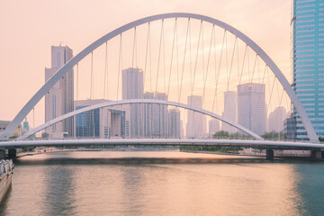 Fototapeta premium The urban architectural skyline, modern bridges, and Haihe River scenery of Tianjin, China on August 11, 2024