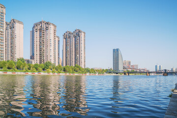 Fototapeta premium The urban architectural skyline, modern bridges, and Haihe River scenery of Tianjin, China on August 11, 2024