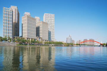 Fototapeta premium The urban architectural skyline, modern bridges, and Haihe River scenery of Tianjin, China on August 11, 2024