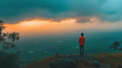 Obraz premium Stormy Skies Over Mountain Landscape at Dusk