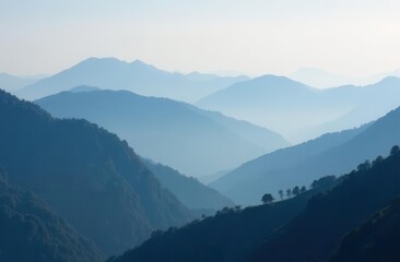 Serene mountain landscape with misty blue hills and foggy atmosphere