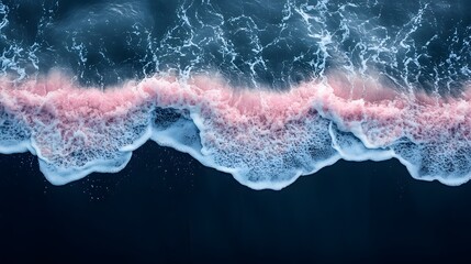 Fototapeta premium waves crashing on to the beach at the final sun light of the day, golden hour effect