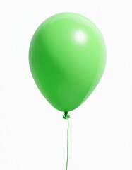 Single green balloon floats on white background. Symbolizes celebration, joy. Helium filled inflatable toy on string for party decor. Minimal graphic design element with copy space.