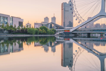 The urban architectural skyline, modern bridges, and Haihe River scenery of Tianjin, China on August 11, 2024