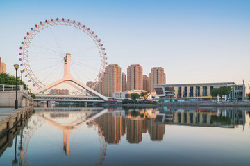 Obraz premium The urban architectural skyline, modern bridges, and Haihe River scenery of Tianjin, China on August 11, 2024
