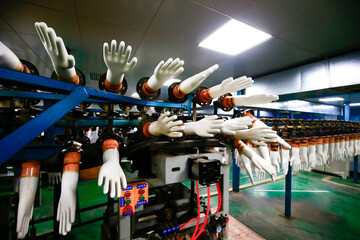 Obraz premium Gloves factory production workshop and mechanical equipment