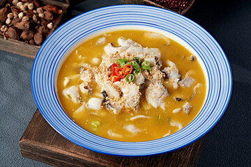 Boiled Grass Carp Fillet in Spicy Sour Soup