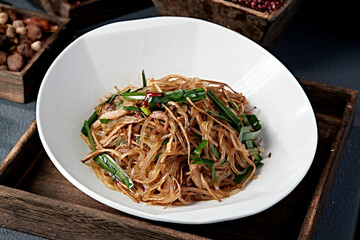 Spicy stir-fried leeks, shredded pork, and tea tree mushrooms with crystal powder