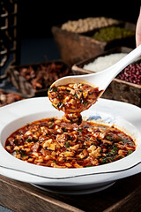 Local stir-fried spicy pork intestines, chives and tofu