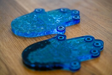 High resolution close up image of a blue Hamsa Jewish good luck char, with crystals and beads with...