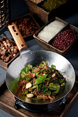 Stir-fried pork belly with garlic, green pepper and soy sauce