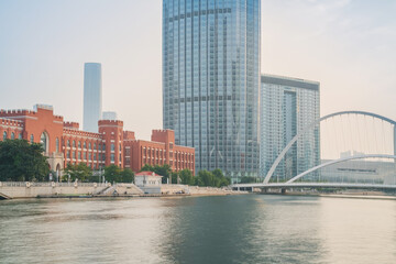 The urban architectural skyline, modern bridges, and Haihe River scenery of Tianjin, China on August 11, 2024