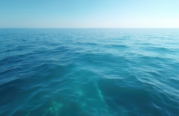 Fototapeta premium Aerial view of empty ocean with slightly rippled turquoise water surface. Calm sea nature background reflects sunlight. Minimalist wallpaper embodies tranquility, vastness, clarity. Summer backdrop