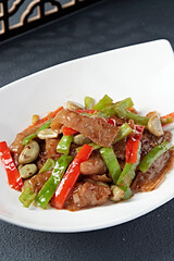 Stir-fried pork skin with Laba garlic and double pepper