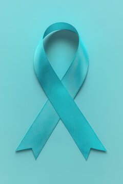 Turquoise and teal ribbon on a soft pastel background for awareness campaigns and decorative purposes SAAM Day of Action