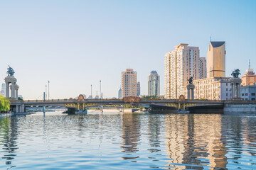 Obraz premium The urban architectural skyline, modern bridges, and Haihe River scenery of Tianjin, China on August 11, 2024
