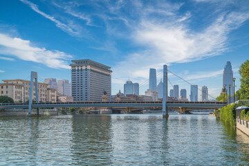 Fototapeta premium The urban architectural skyline, modern bridges, and Haihe River scenery of Tianjin, China on August 11, 2024