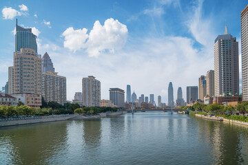 Fototapeta premium The urban architectural skyline, modern bridges, and Haihe River scenery of Tianjin, China on August 11, 2024
