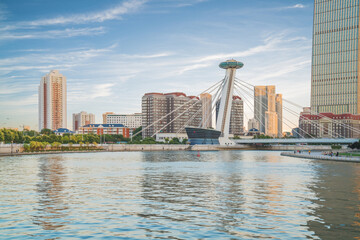 Fototapeta premium The urban architectural skyline, modern bridges, and Haihe River scenery of Tianjin, China on August 11, 2024