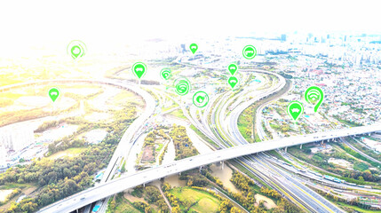 Aerial View of City Highway Network with Green Location Icons
