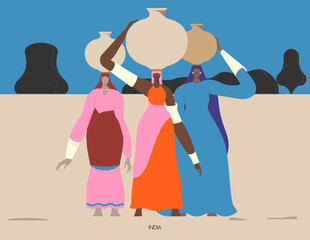 Women walking with water pots on their heads through a barren land