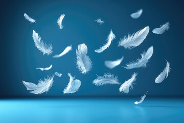 Floating white feathers gracefully descending against a serene blue background, creating a calming atmosphere