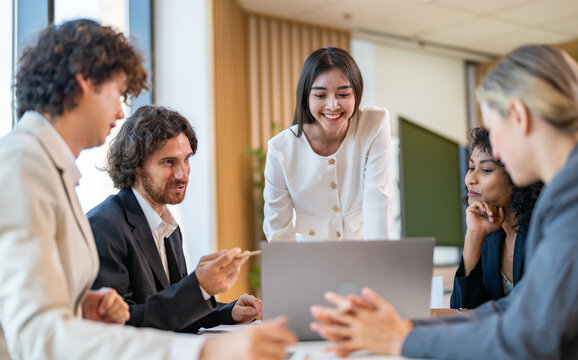 Group creative diverse business meeting and discussing strategy startup project analysis finance process.Success asian business people work plan and brainstorm marketing idea with laptop in office