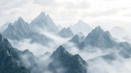 Obraz premium A majestic Asian mountain range with mist rolling over its peaks