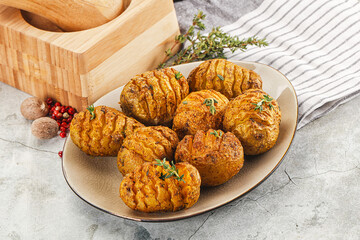 Baked baby potato with thyme