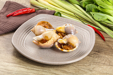 Snails baked with garlic and spices