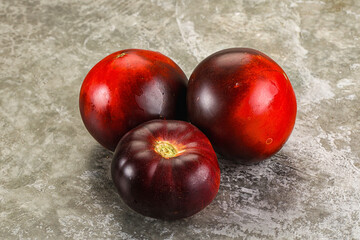 Black ripe juicy organic tomato