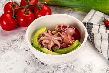 Salad with baby octopus and avocado