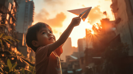 A young Asian child in a modern Angolan cityscape