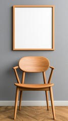 Simple yet elegant wooden chair positioned in front of a blank poster creating a minimalist aesthetic