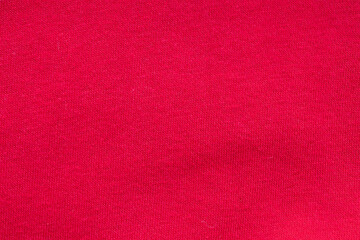 Red fabric cloth texture background close up