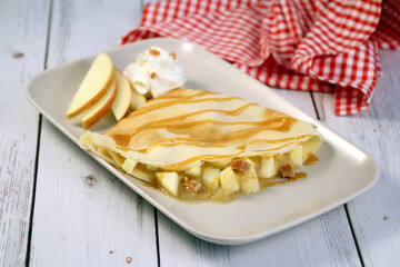 Apple pancakes with caramel sauce 