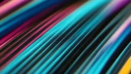 Close-up of a colorful collection of thin objects with varied hues and textures.