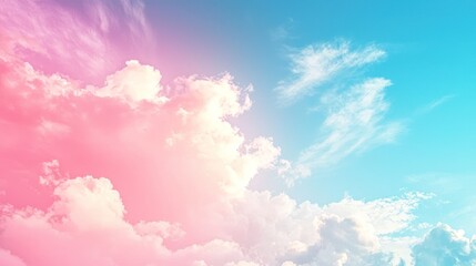 Fototapeta premium Soft Pink and Blue Sky with Fluffy Clouds at Sunrise