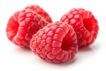 Three ripe raspberries isolated on white background