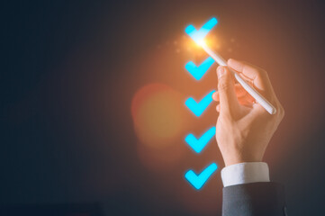 DevOps concept, software development, IT operations, agile programming, Businessman hand tick...