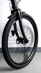 Fototapeta premium Photo of a black bicycle wheel. Spare parts for transport, digital art. with white shades