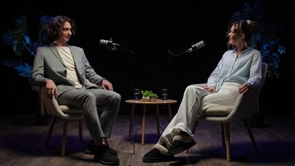 Engaging Conversations Unfold in a Modern Podcast Studio With Expert Guests