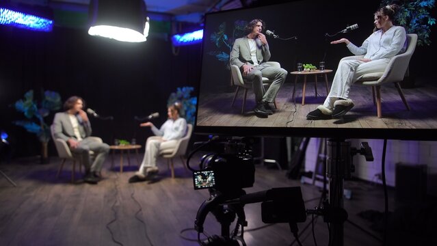 Engaging Discussion Unfolds in a Vibrant Podcast Studio Setting Focused on Expert Storytelling