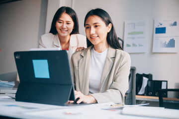 Group of Asian business people team meeting in modern office working design planning and ideas concept