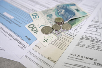 investment polish tax form PIT 37 38 pln zloty banknotes pen. Tax for time. Polish inscription, PIT