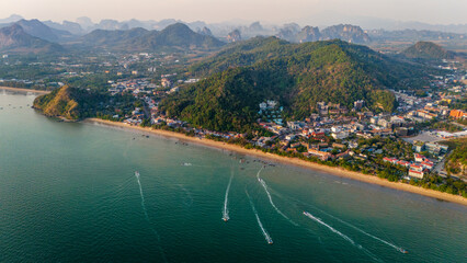 aerial view of Krabi limestone seascape at sunset revealing Ao Nang resort town