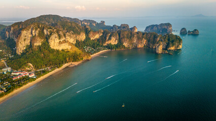 aerial view of Krabi limestone seascape at sunset revealing Ao Nang resort town