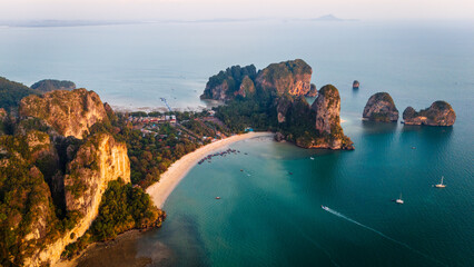 Drone sunset view of Krabi most famous beach Railay on the Andaman sea in Ao nang beach aerial of Thailand holiday destination with resort and cliff