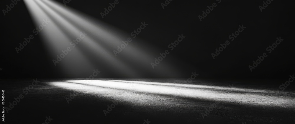 Aufkleber spotlight creates minimalistic empty space for text or product presentation on smooth black surface