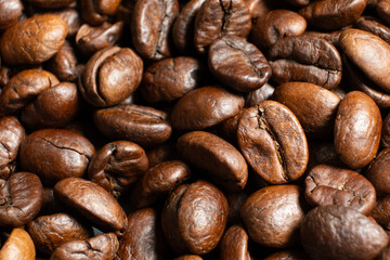 Decaffeinated coffee beans roasted close up